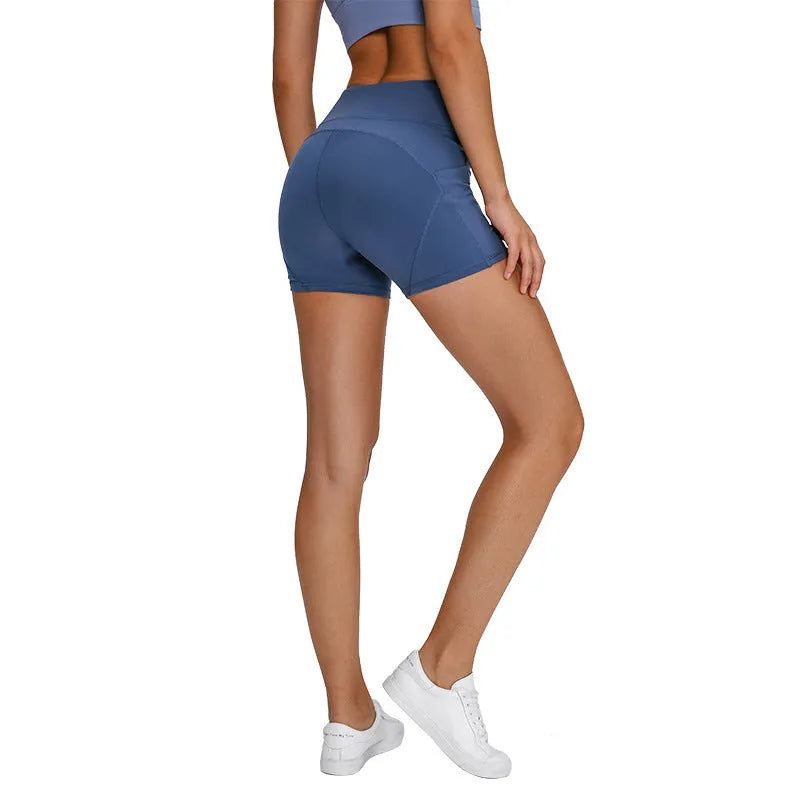 SHINBENE high waisted women's athletic shorts in black with two side pockets, soft cotton blend fabric