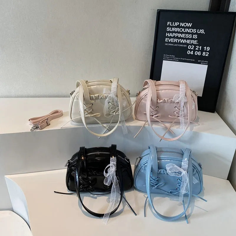 Women's PU leather shoulder handbag with removable bandage bow and phone compartment in milky white