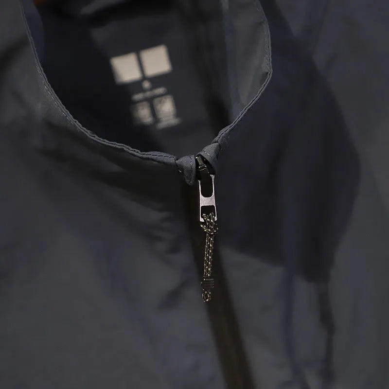 Men's thin nylon bandage-style vest in army green with side seam pockets on a hanger.