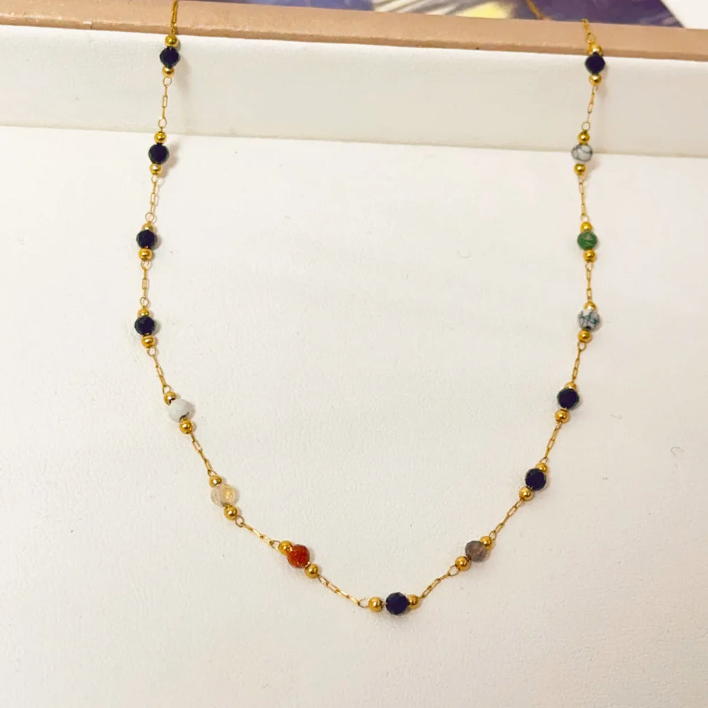 Gold-coloured titanium steel necklace with a retro O-ring chain and simple pendant.