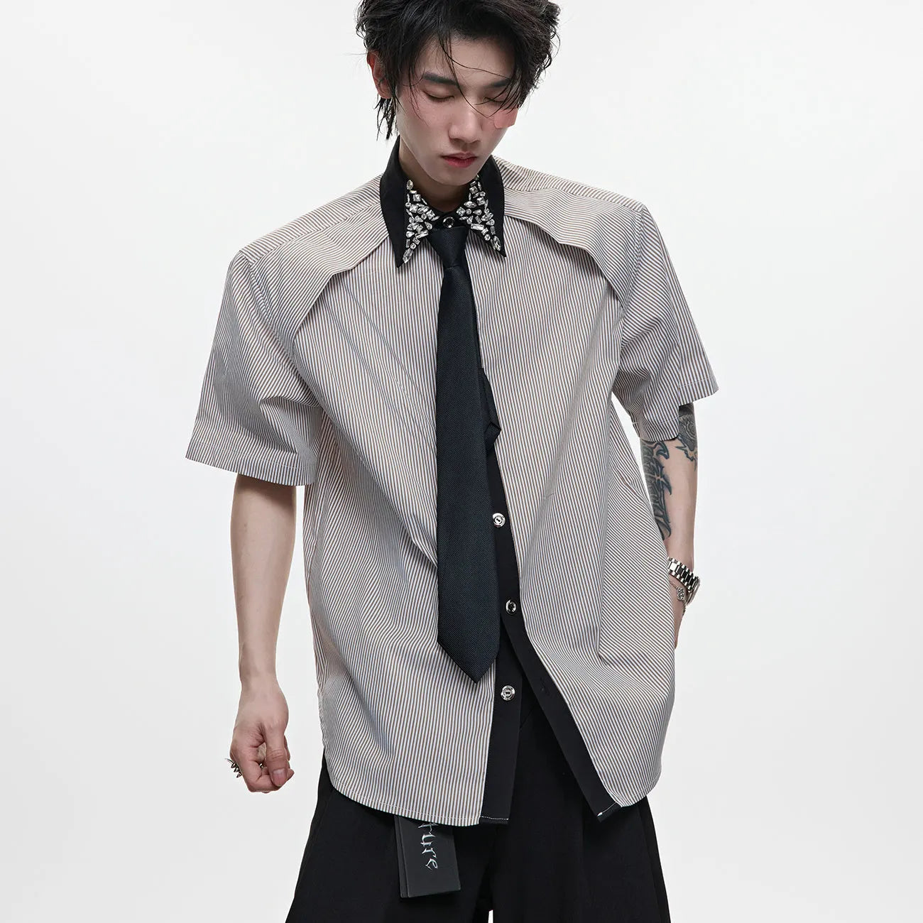 Men's blue patchwork striped shirt with diamond tie detail, loose fit, and button-down collar
