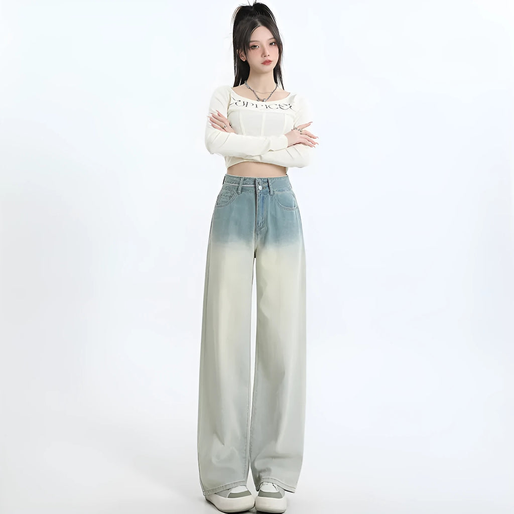 Women's gradient blue straight-leg denim trousers on a hanger.