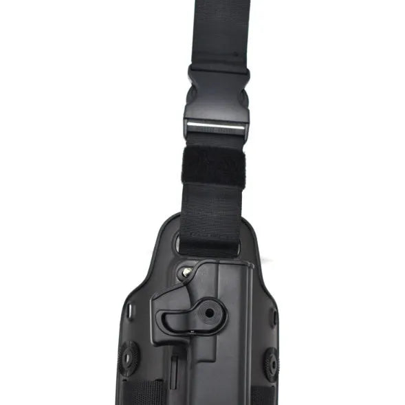 Tactical leg holster with waist plate and quick-pull plastic construction in outdoor setting