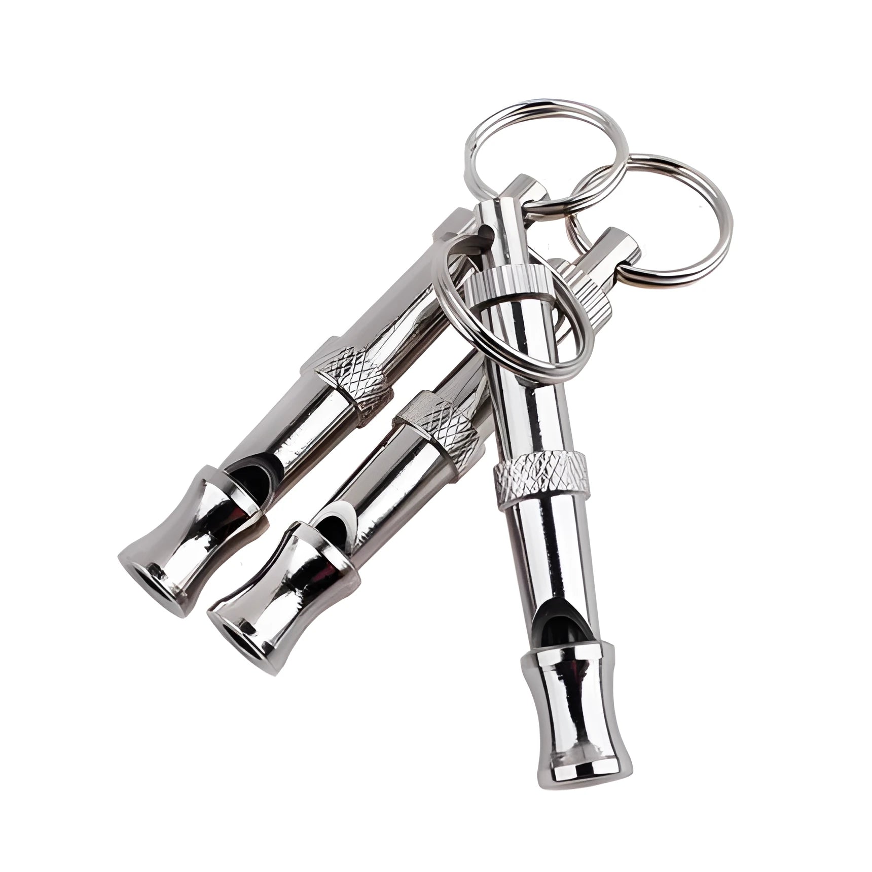 Silver ultrasonic adjustable dog training whistle made from stainless steel on a light background