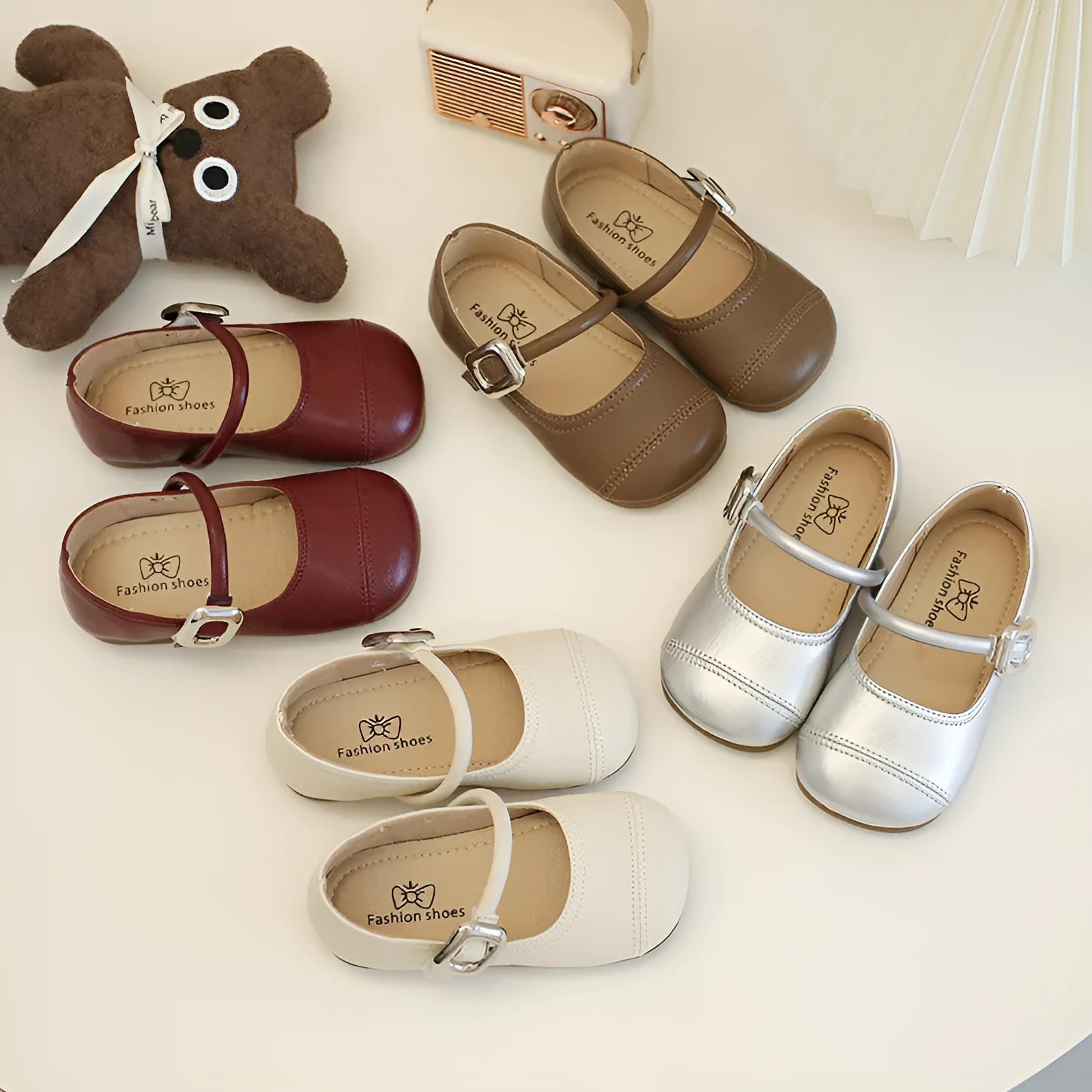 Girls PU leather Mary Jane shoes in solid beige colour with single strap, size 35, side view