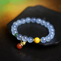 Women's geometric bracelet with blue 8mm aquamarine beads and ethnic retro design.