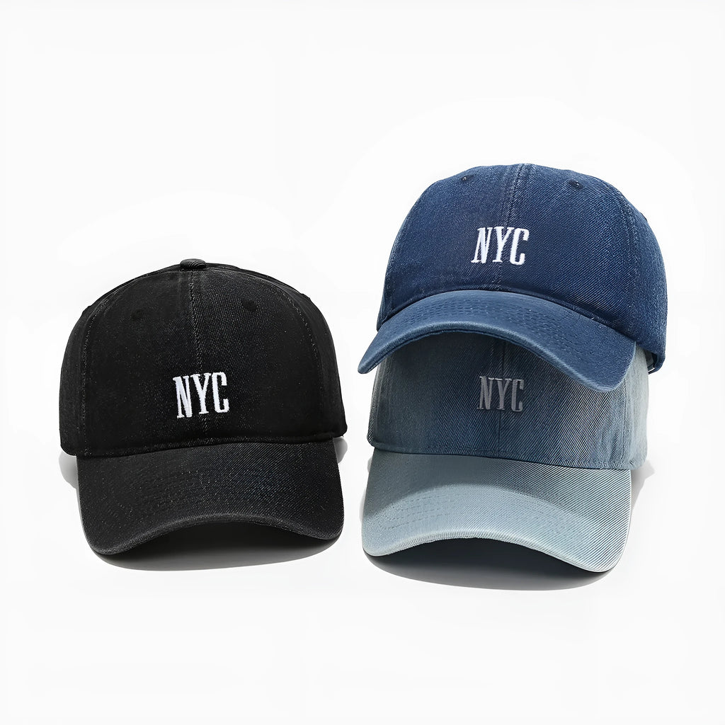 Adjustable denim peaked cap with embroidered lettering in light blue, dark blue, or black