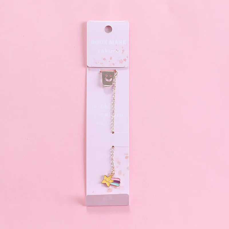 Alloy metal bookmark with cartoon pendant designs including panda, rocket and unicorn variations
