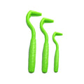 Three coloured plastic tick hook tools for removing ticks from dogs.