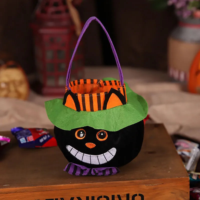 Square 16cm Halloween candy bag in pumpkin, witch, vampire, or black cat velvet pattern.