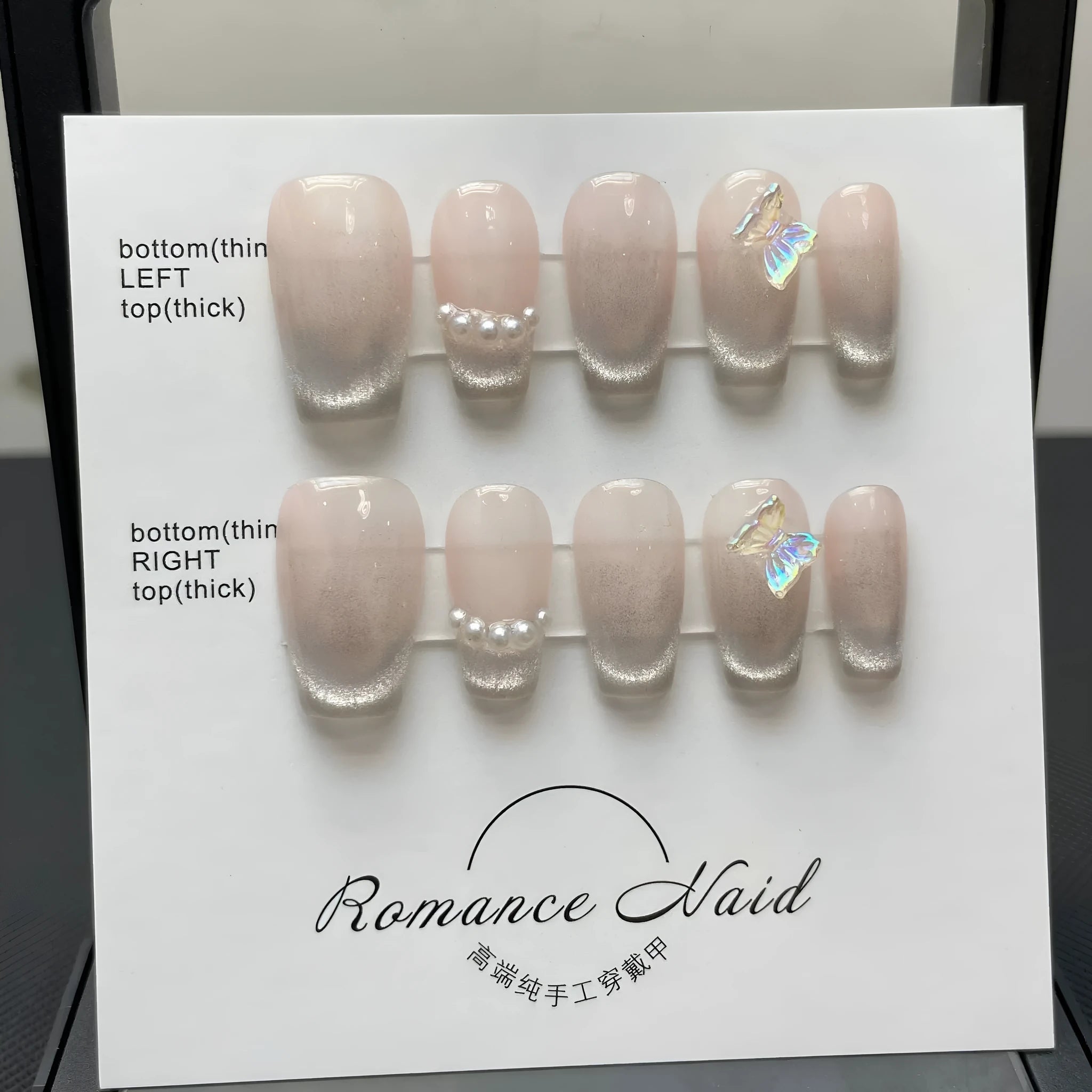 Women's hand-painted blush armour artificial nail set with short length design showing four size options