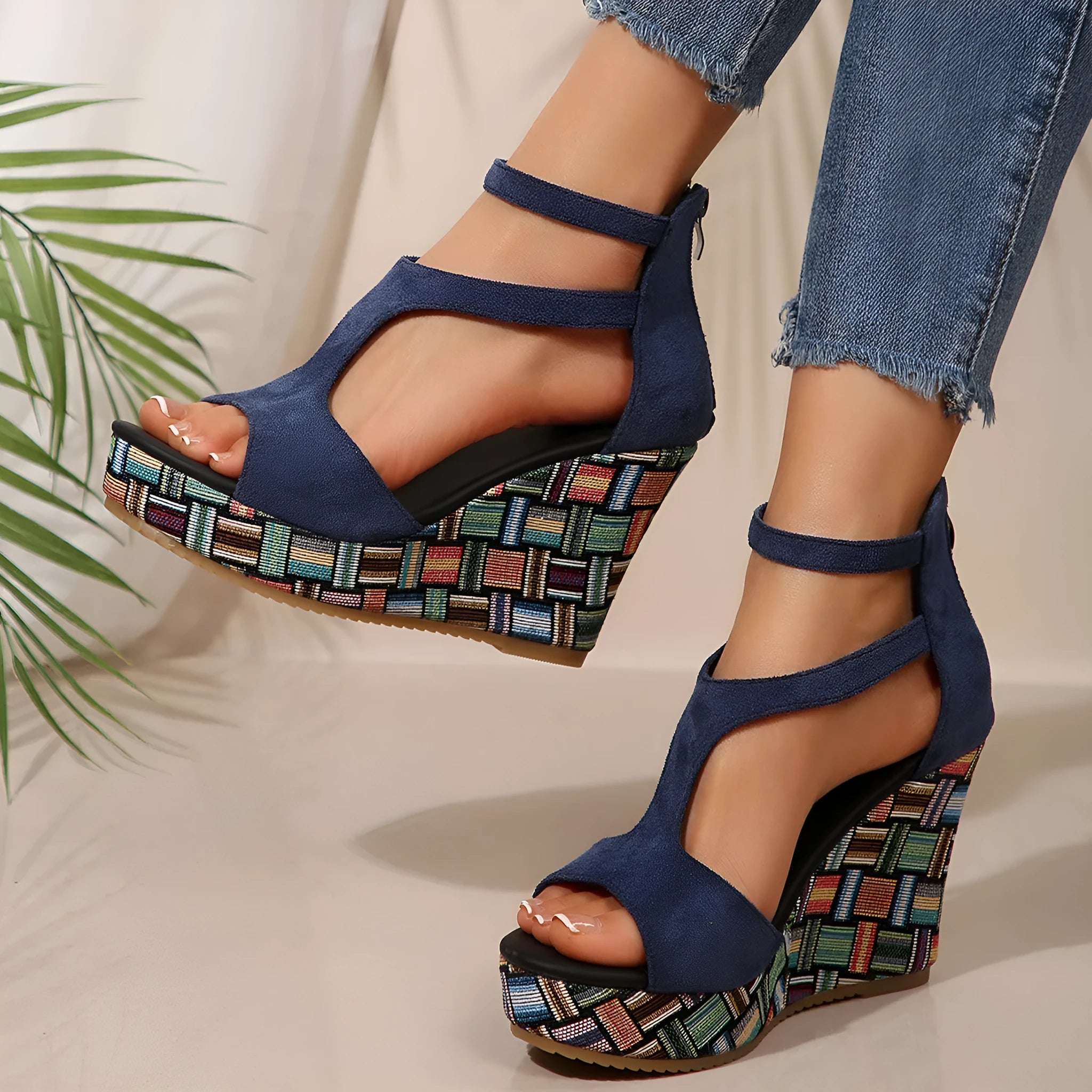 Women's cream white ankle-strap sandals with thick rubber sole, buckle closure, and cloth upper.