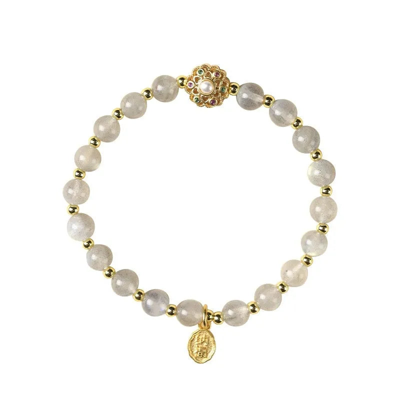 Hand-woven crystal bracelet with gray moonstone, sunstone, and strawberry quartz beads in pastoral style.
