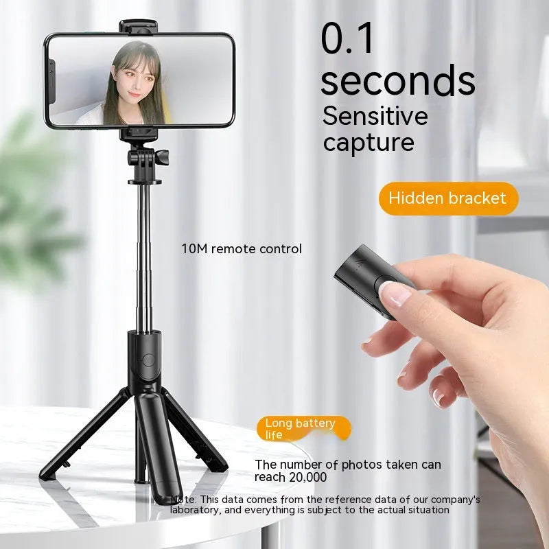 Black selfie stick tripod with wireless Bluetooth remote, universal phone holder, and optional ribbon fill light