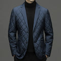 Man wearing a thick black lapel down jacket with side seam pockets.