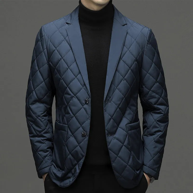 Man wearing a thick black lapel down jacket with side seam pockets.