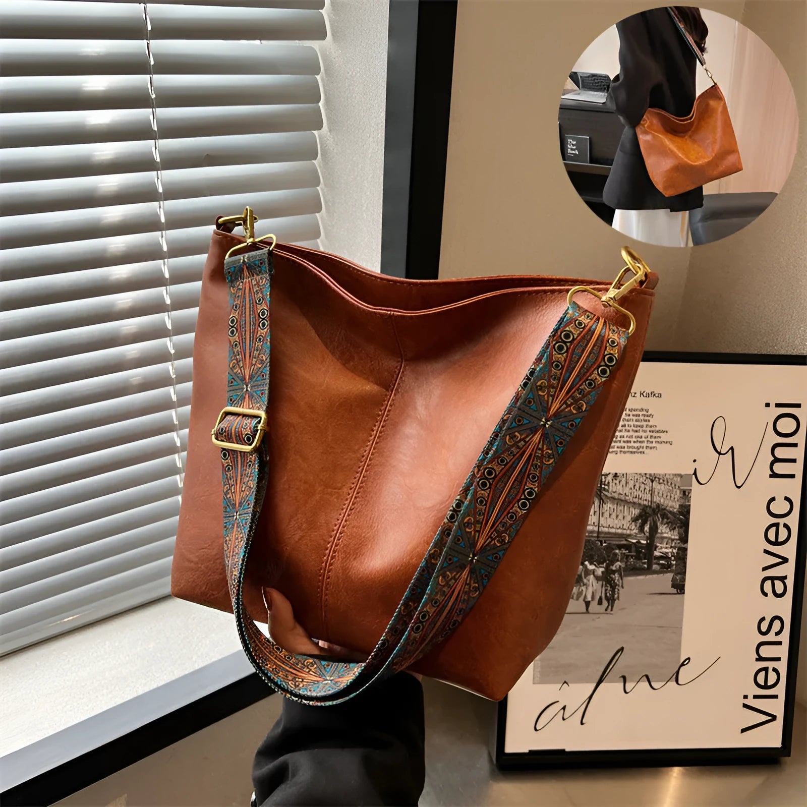Retro bucket bag with wide shoulder strap, solid colour in beige, shown from front angle