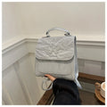 Women's white PU leather hand-carry backpack with bow detail and mobile phone compartment