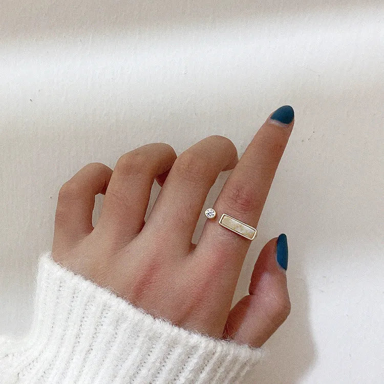 Cream zircon marble ring with true gold plating on a copper base, adjustable opening, retro geometric design