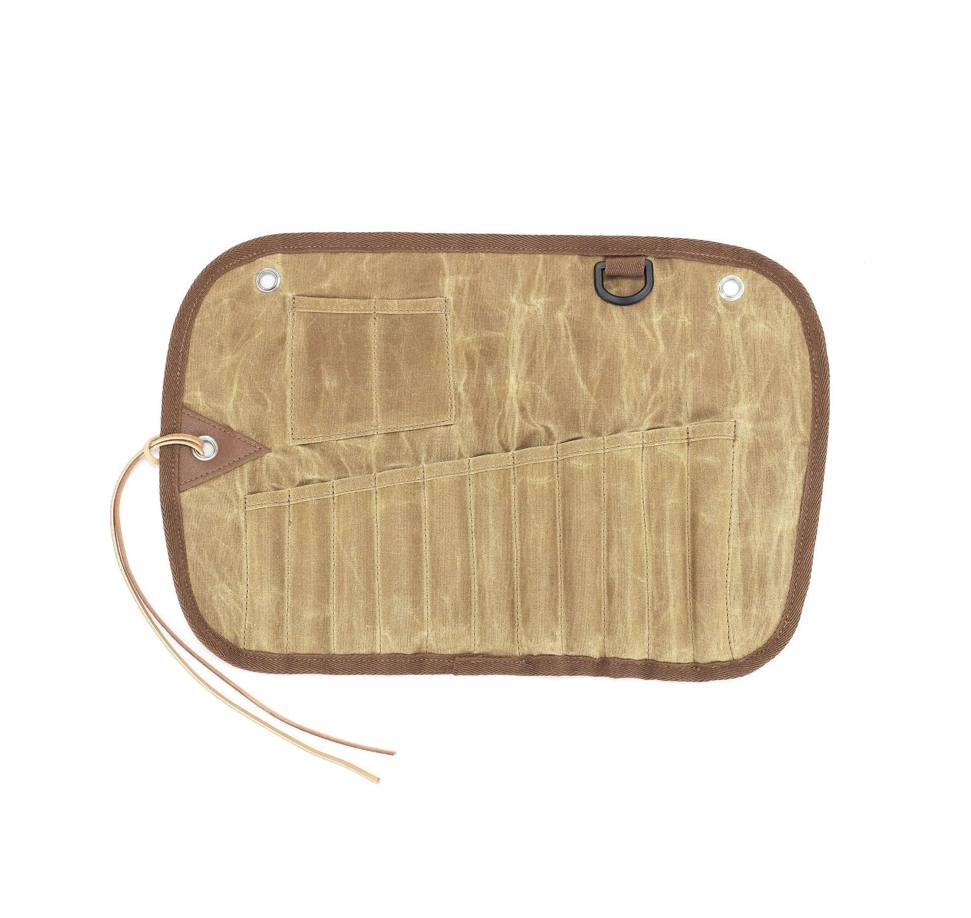 Green waxed canvas storage bag containing a wooden handle cutlery set for outdoor use.