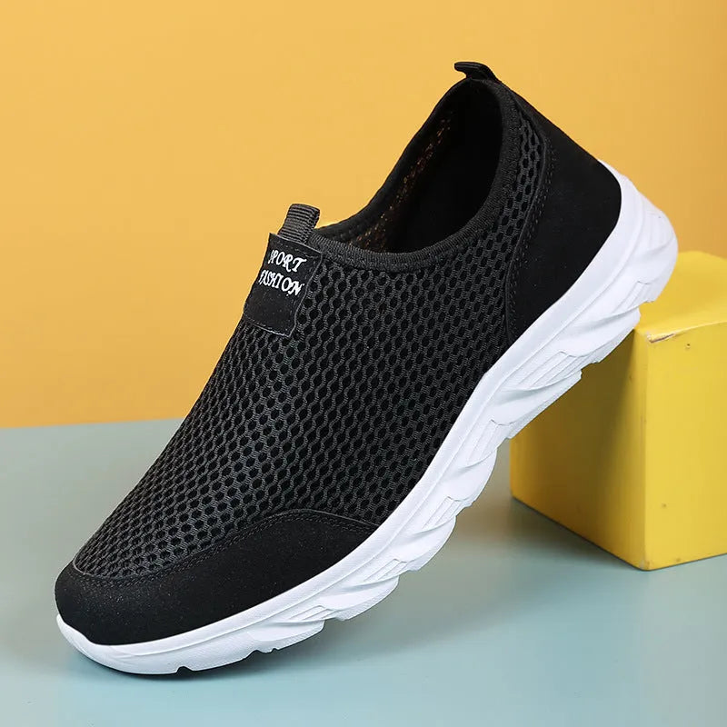 Large size mesh low-top casual sneakers with EVA sole, round toe, and sewing thread detail in grey, dark blue, black and white, or all black.