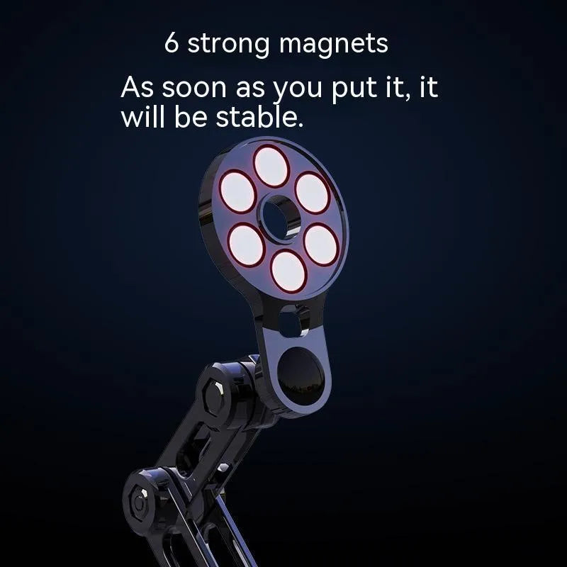 Black magnetic car phone holder mounted on dashboard with phone attached showing 360-degree rotation capability