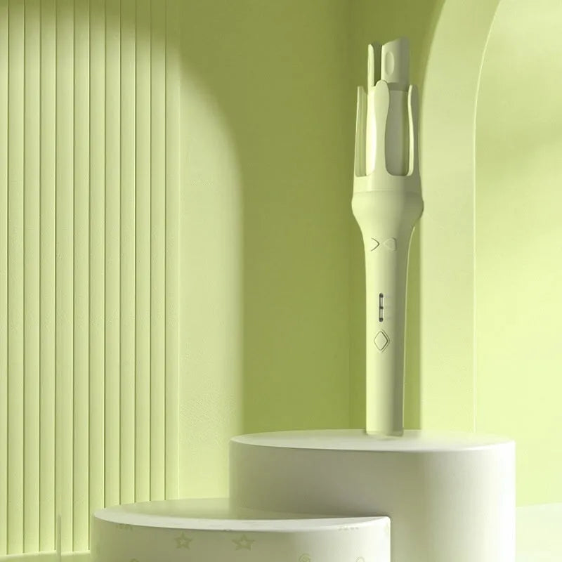 White and pink automatic hair curler with a rotating 32mm ceramic barrel and a power plug.