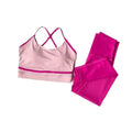 Women's blue and white quick-drying nylon spandex yoga pants and sleeveless tank top set.
