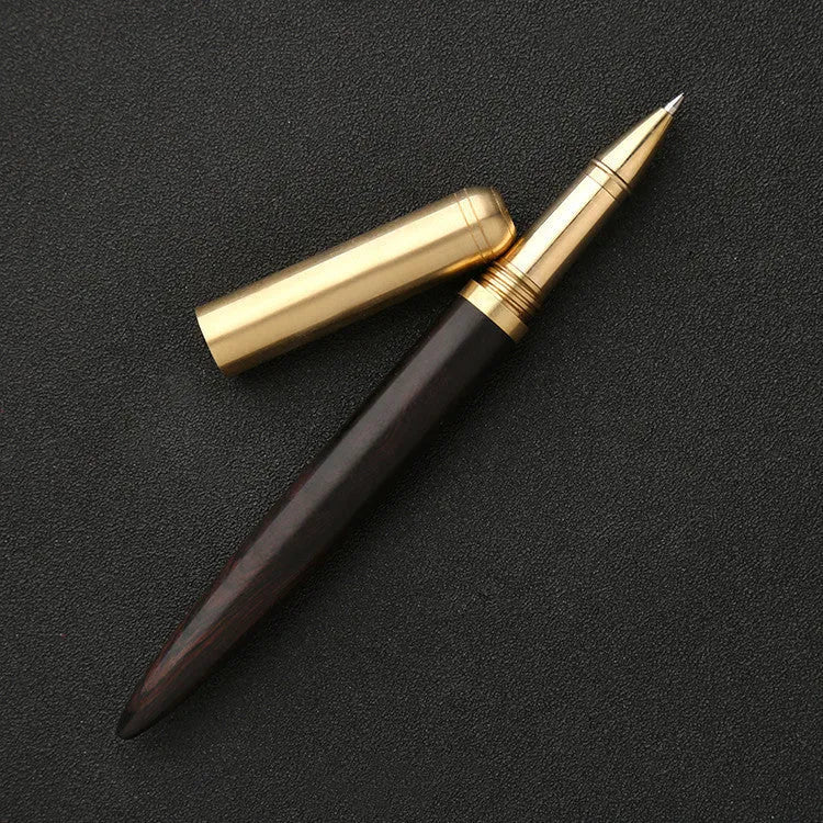 Brass and sandalwood signature pen showing wood grain and metal details at 14cm length