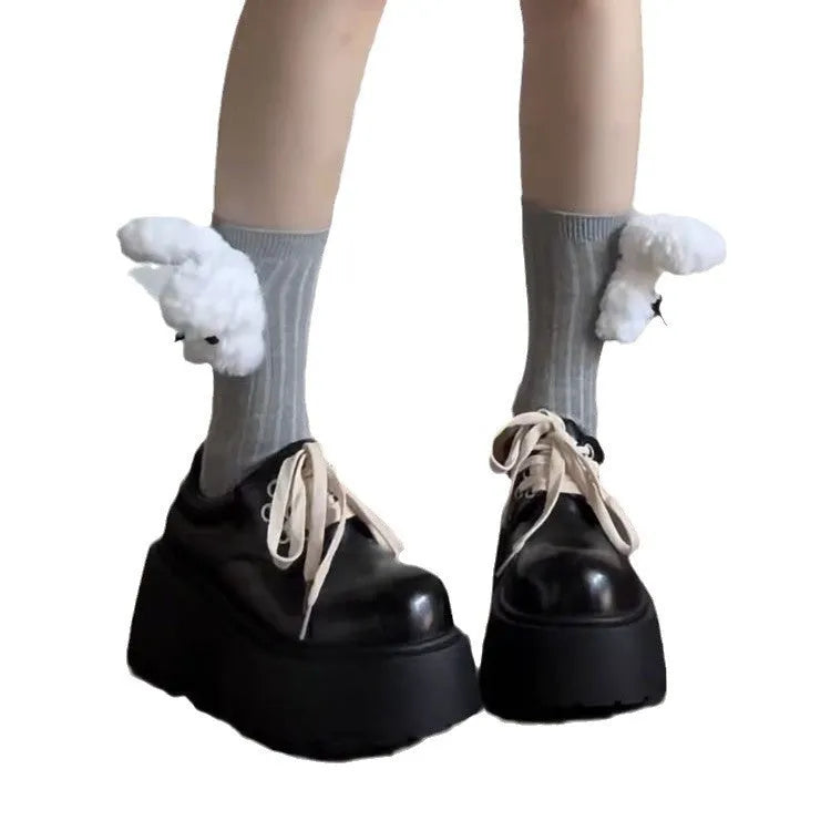 Matte black women's chunky sole lace-up shoes with a round toe and buckle detail.