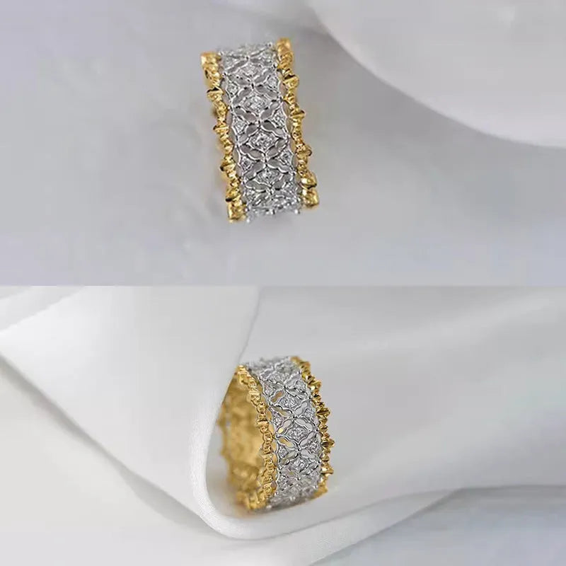 Geometric round two-tone gold zircon ring on a copper band.