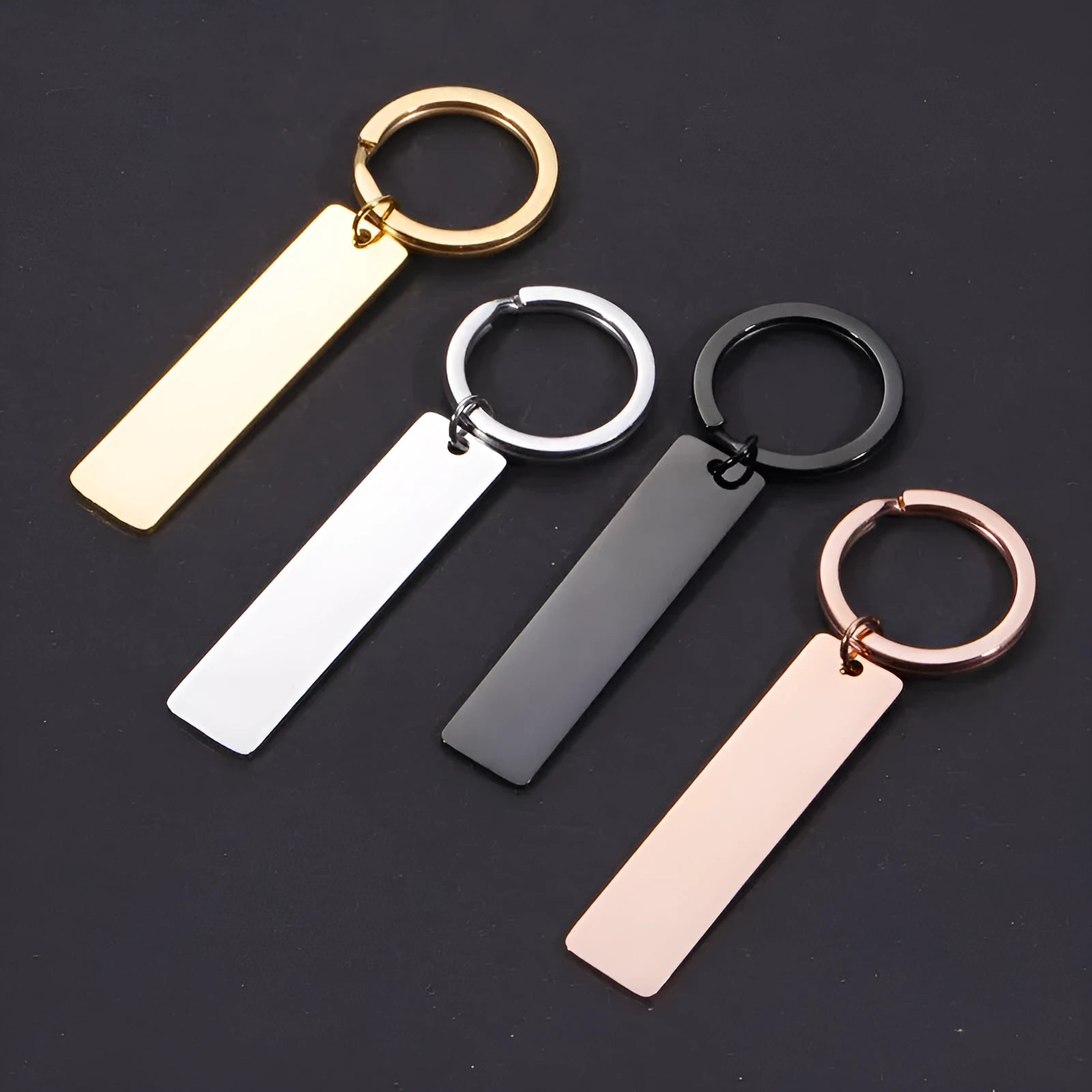 Stainless steel keychain with laser-engraved Spotify code in rose gold finish, rectangular pendant