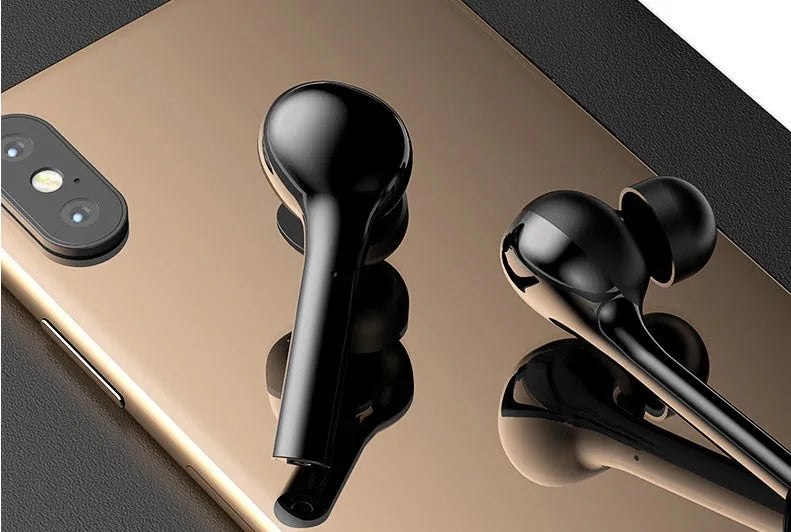 Black and white wireless touch-control earbuds with charging case