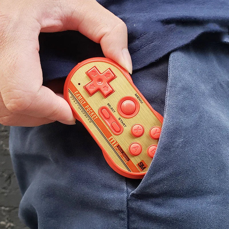 Mini handheld video game console with built-in 20 NES games, AV output, red colour, 85x45x15mm