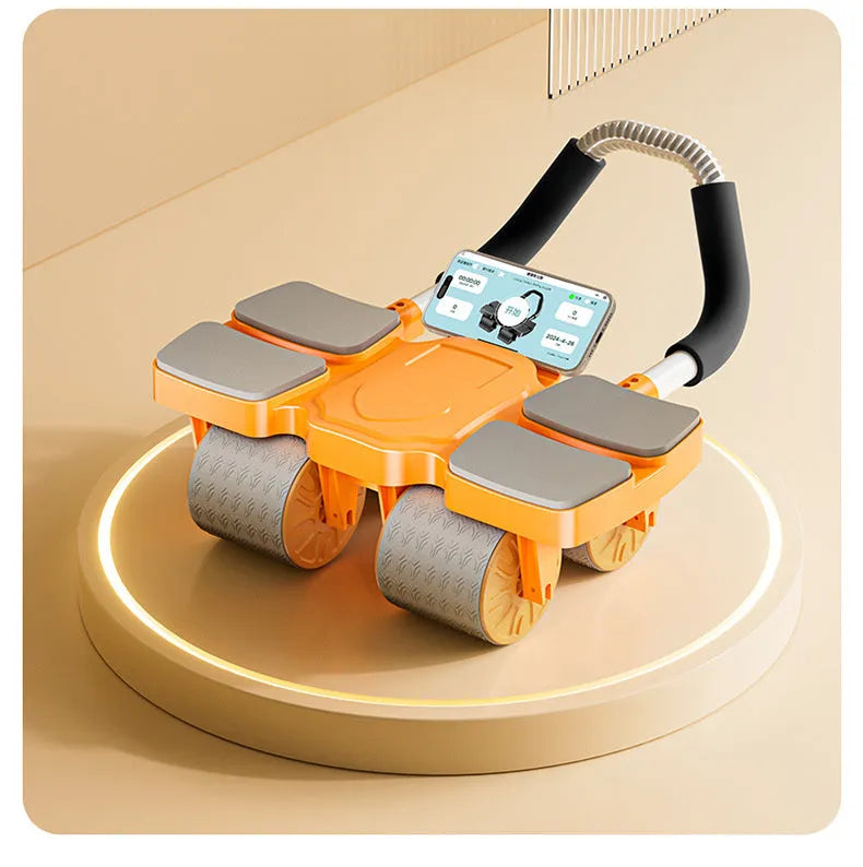 Black abdominal wheel with automatic rebound, four blue wheels, and ergonomic rubber handles on a gym mat.