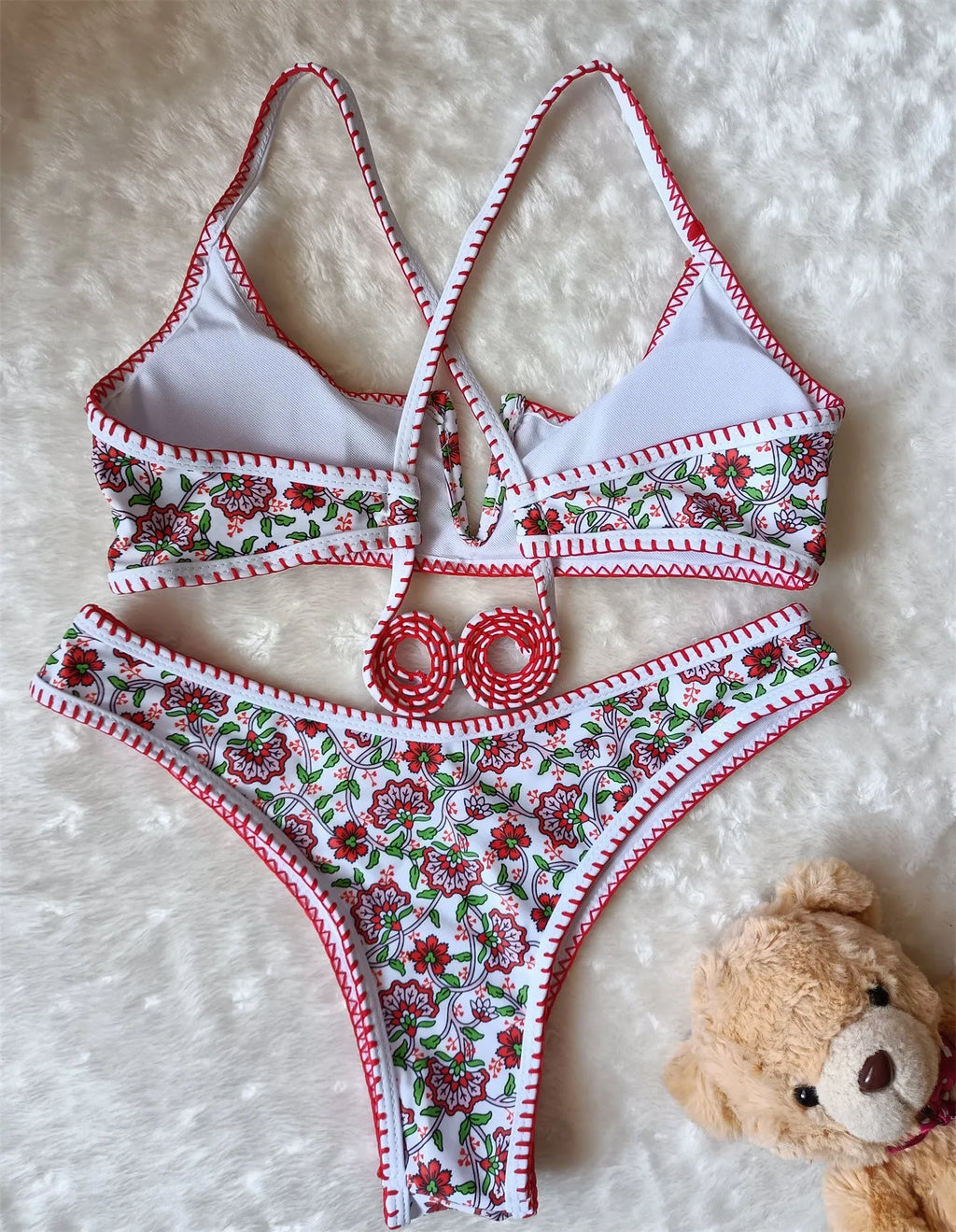 Women's floral print one-piece swimsuit with V-neck and embroidery detail