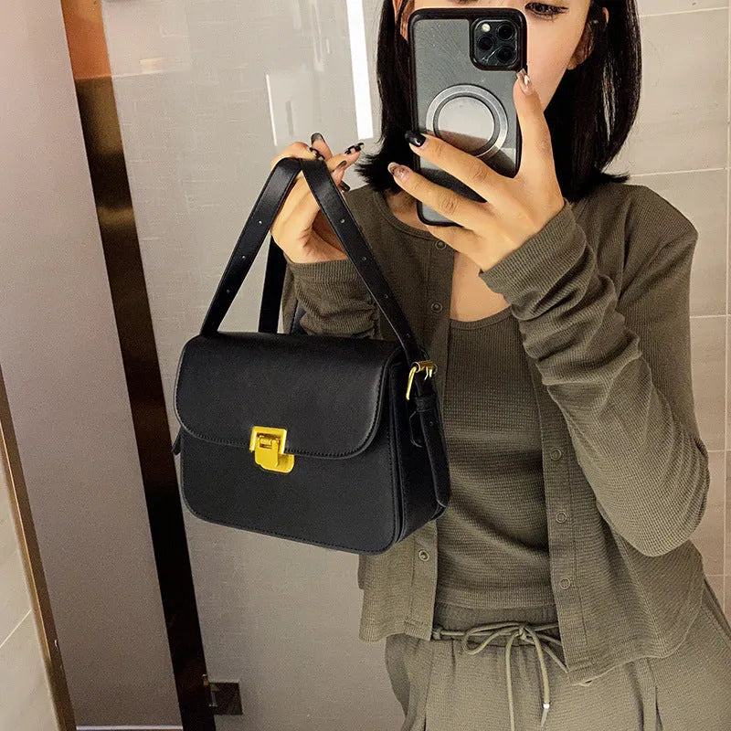 Soft PU leather women's cross-body bag with textured finish in horizontal square silhouette