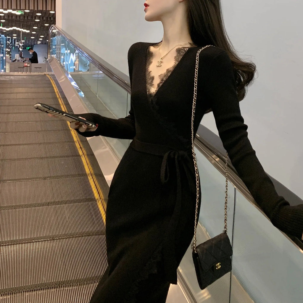 Black slim-fit women's formal skirt with a princess line silhouette on a hanger.