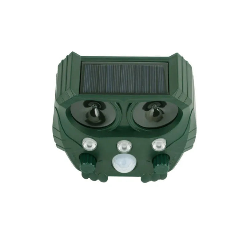 Green solar-powered ultrasonic animal repeller with LED strobe lights for outdoor pest control.