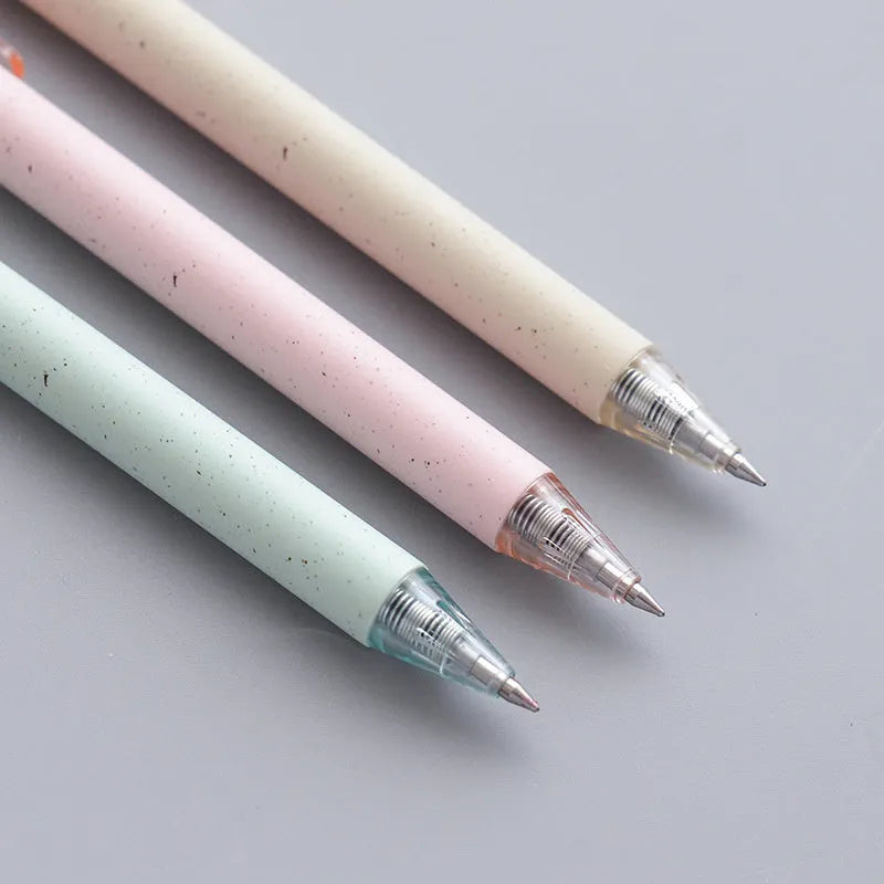 Set of twelve 0.5mm push-type gel pens in beige, blue, green, and pink barrels with black ink.