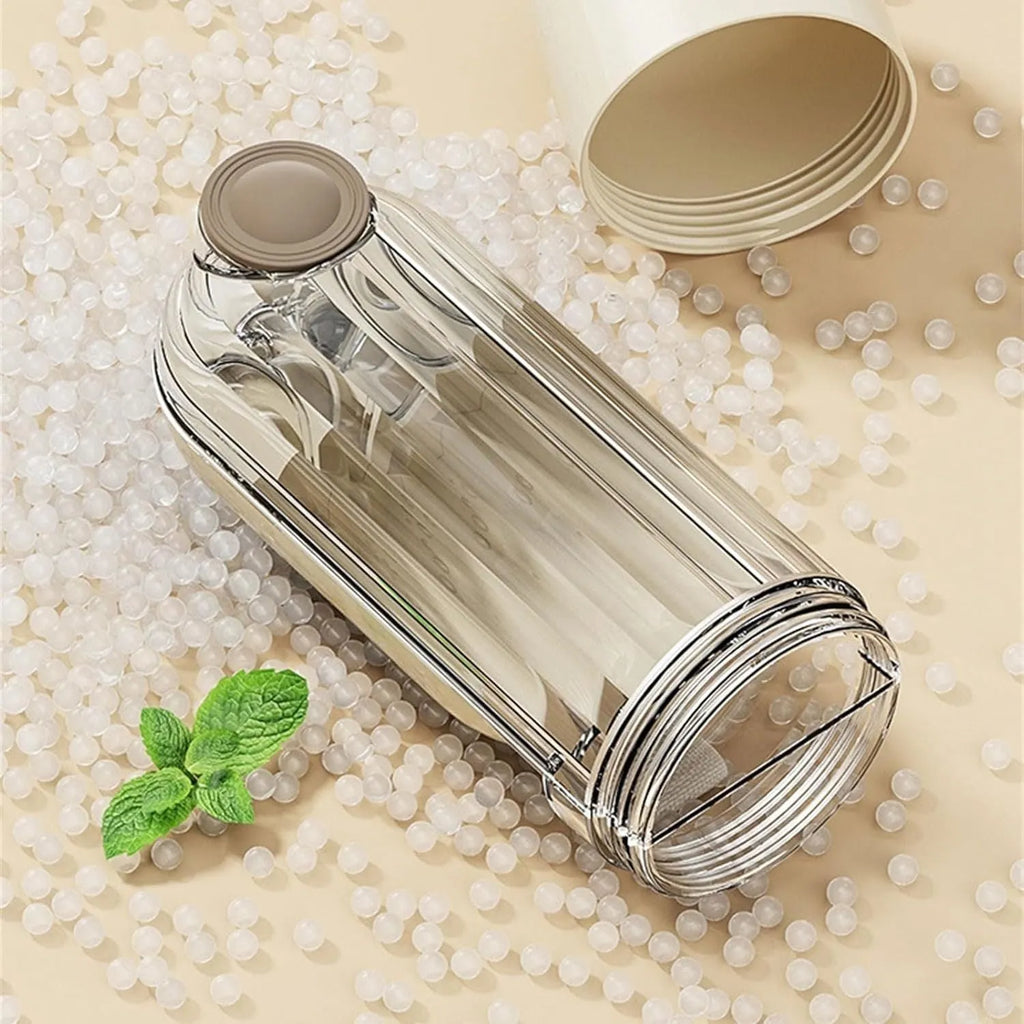 Beige foldable dog water bottle and food dispenser with large drinking opening, shown next to a leash.
