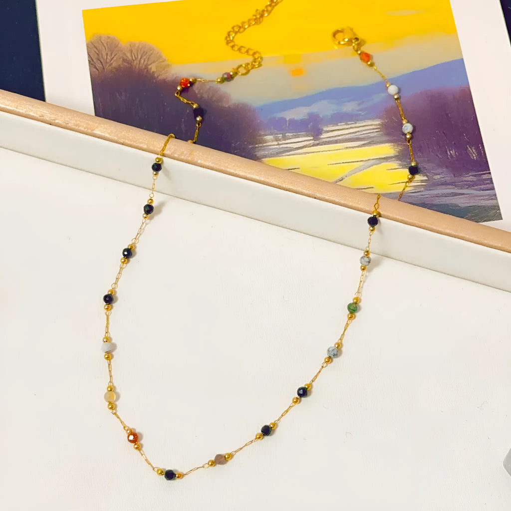 Gold-coloured titanium steel necklace with a retro O-ring chain and simple pendant.