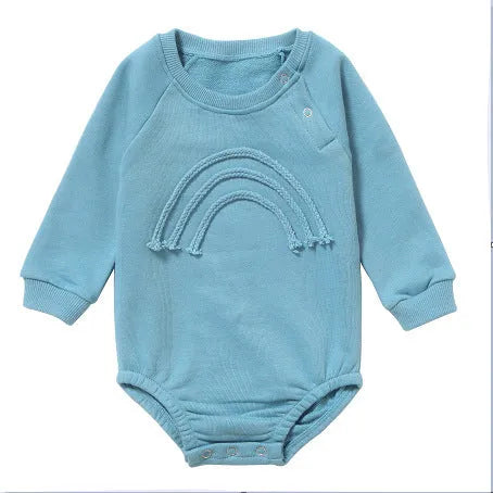 Beige waffle cotton baby romper with long sleeves and cotton rope tie fastening.