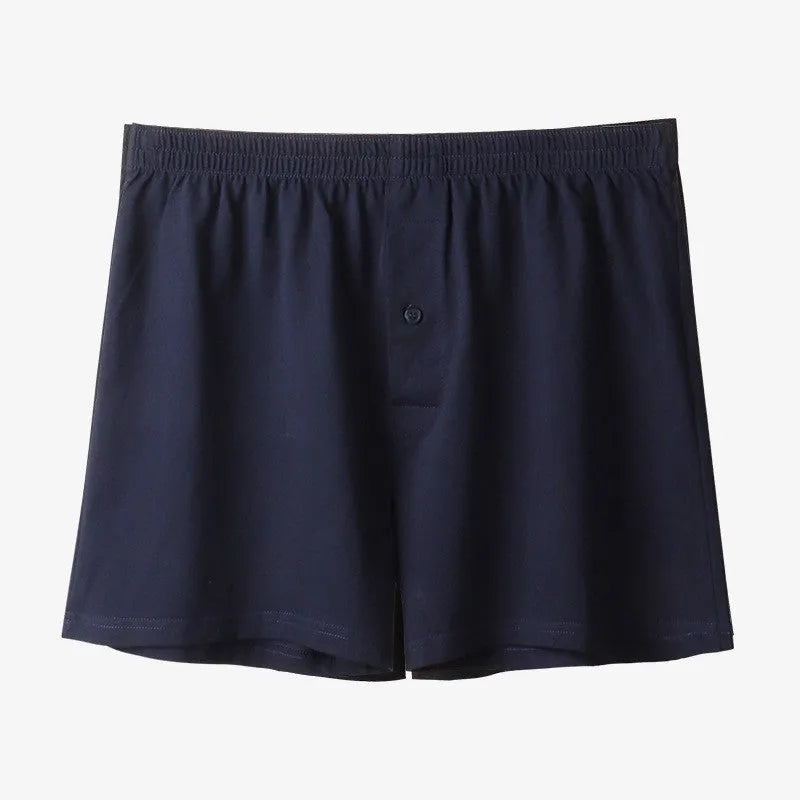 Men's loose fit high waist boxer shorts in pure cotton, shown in light grey, dark blue, and black colours.