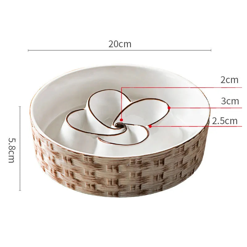Blue ceramic slow feeder dog bowl with maze pattern and non-slip rubber base for large dogs.
