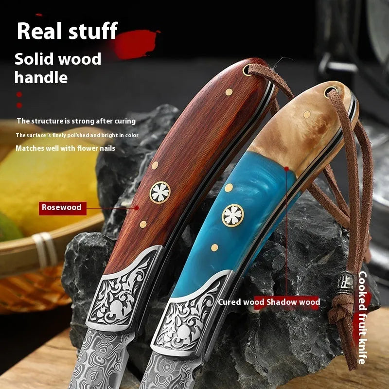 VG10 folding mini outdoor knife showing stainless steel blade and dovetail pattern in blue or red