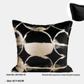 Black and gold abstract full moon pattern flannel cushion on a grey sofa