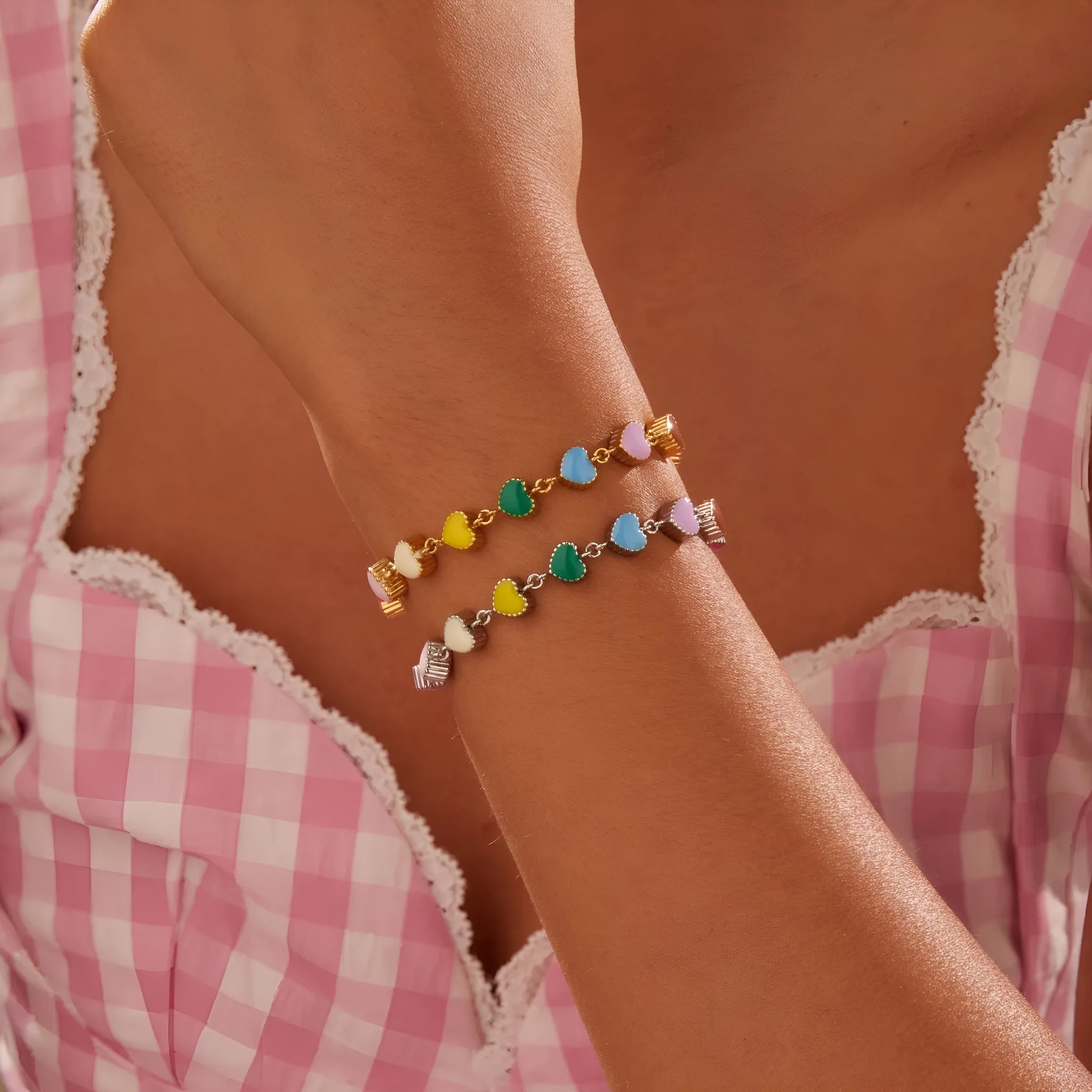 Women's gold bracelet with love heart design, stainless steel construction, and electroplated finish