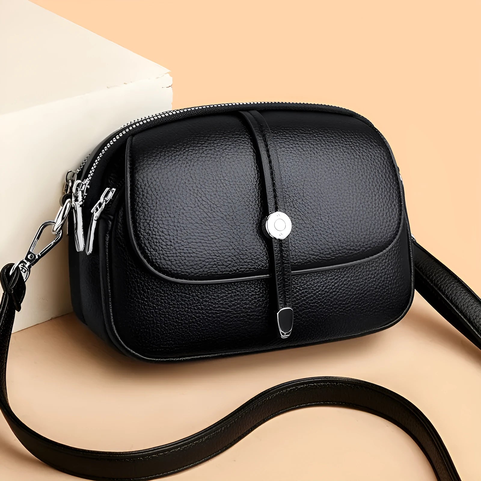 City Simple oval-shaped women's crossbody shoulder bag in khaki PU with sewing thread detail.