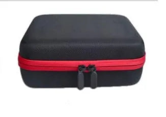 Red EVA cube-shaped essential oil storage bag with 30 compartments and a zipper, shown wall-mounted.